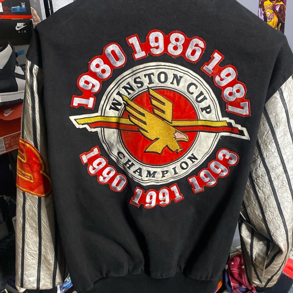 Nike Black and Silver Varsity Jacket with Red Accents
